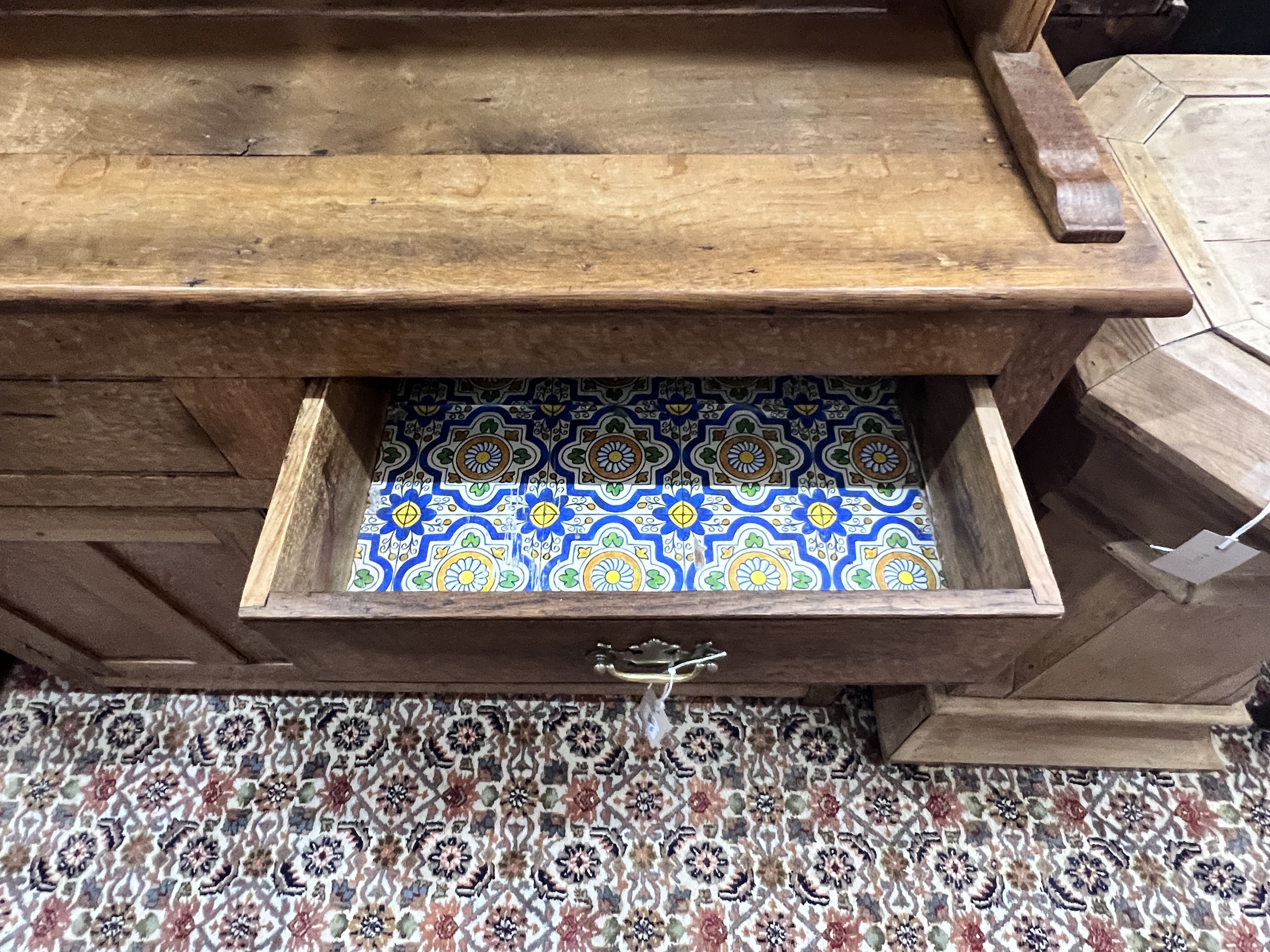 An early 20th century oak dresser, width 122cm, depth 39cm, height 194cm